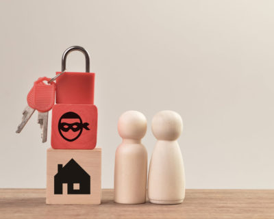 red home lock that represents real estate scams